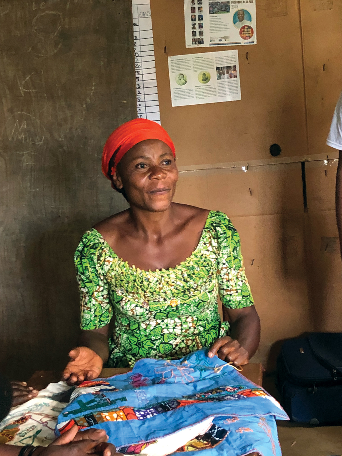 A woman sewing fabric