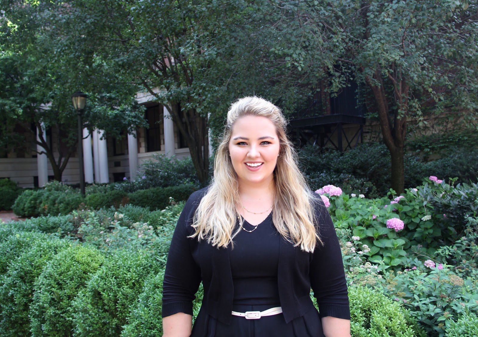 Headshot of Haley Schoeck wearing all black on Barnard's campus.