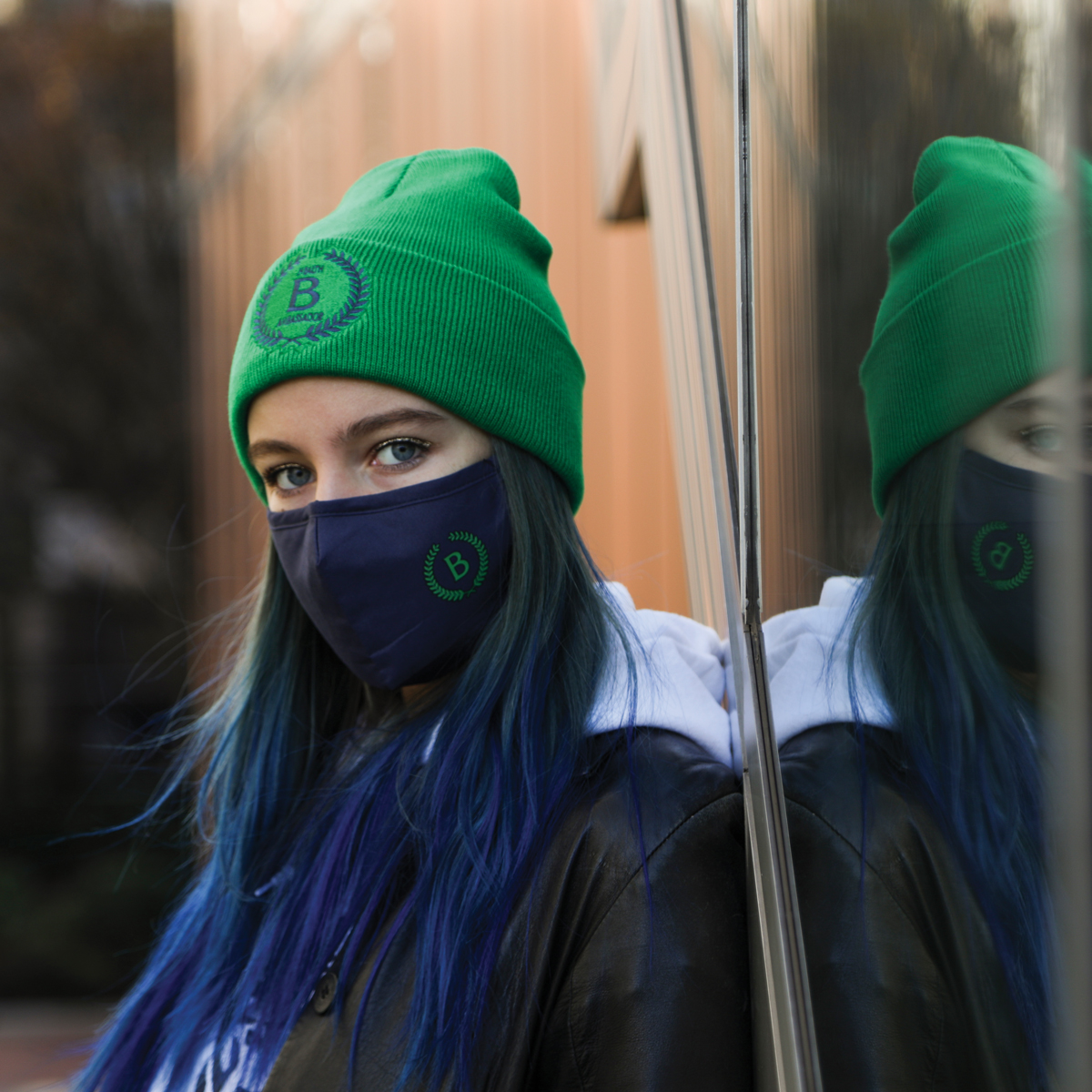 Headshot of Auden Barbour wearing Barnard health ambassador mask