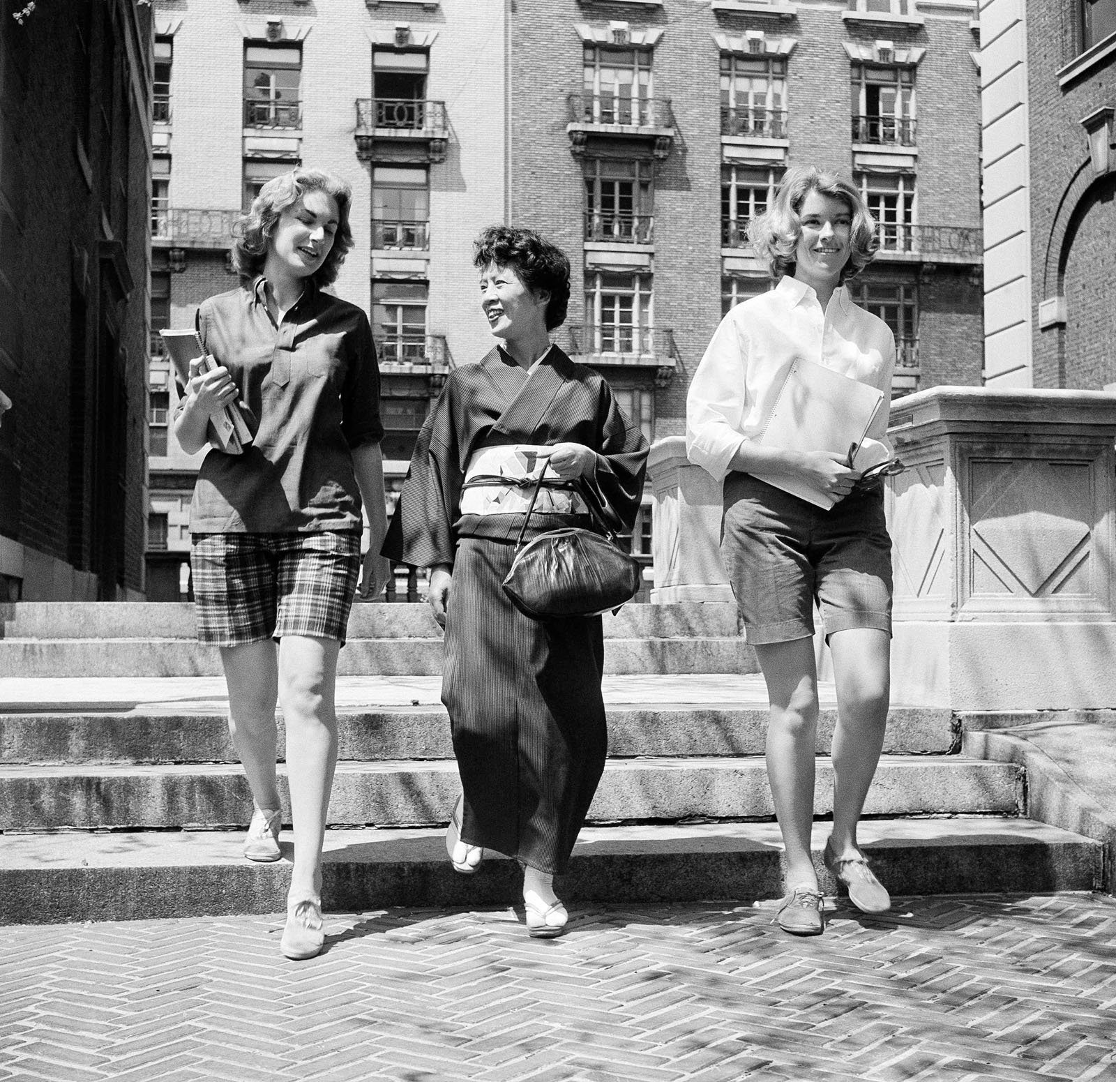 Student on campus in bermuda shorts 1960