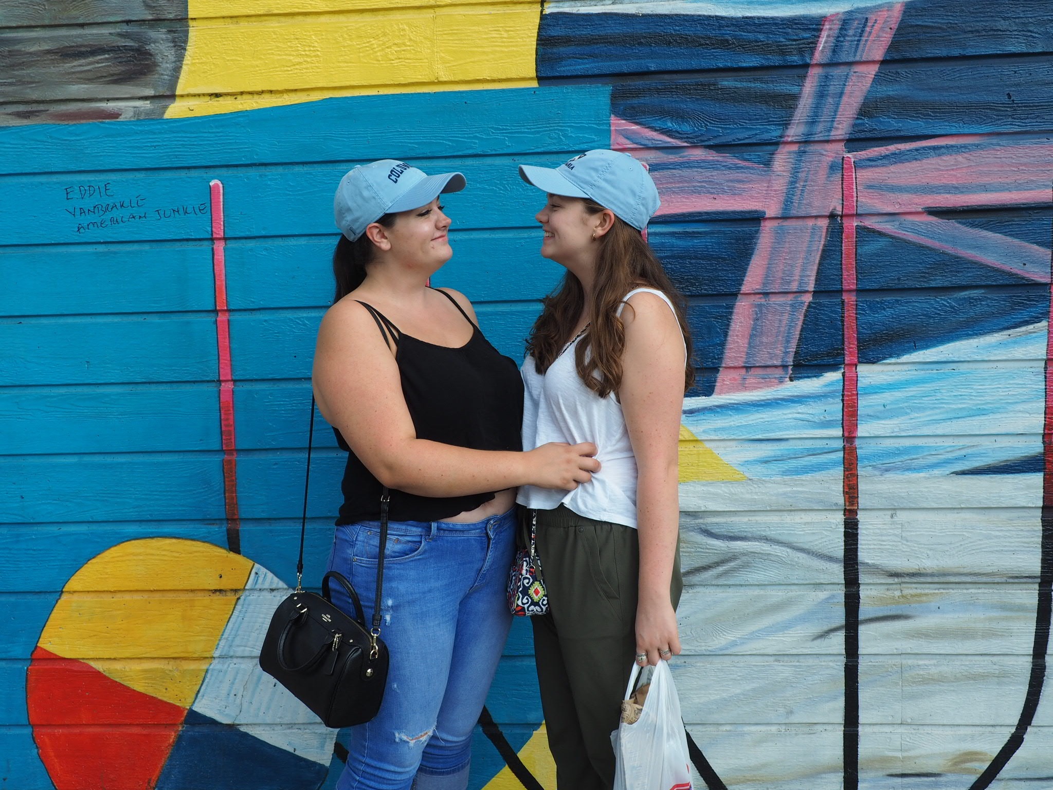 Young women standing together