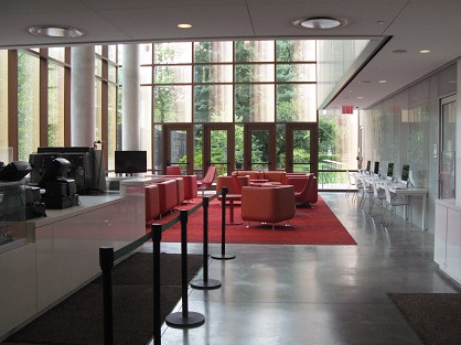 Coffee shop image showing padded chairs and couches.