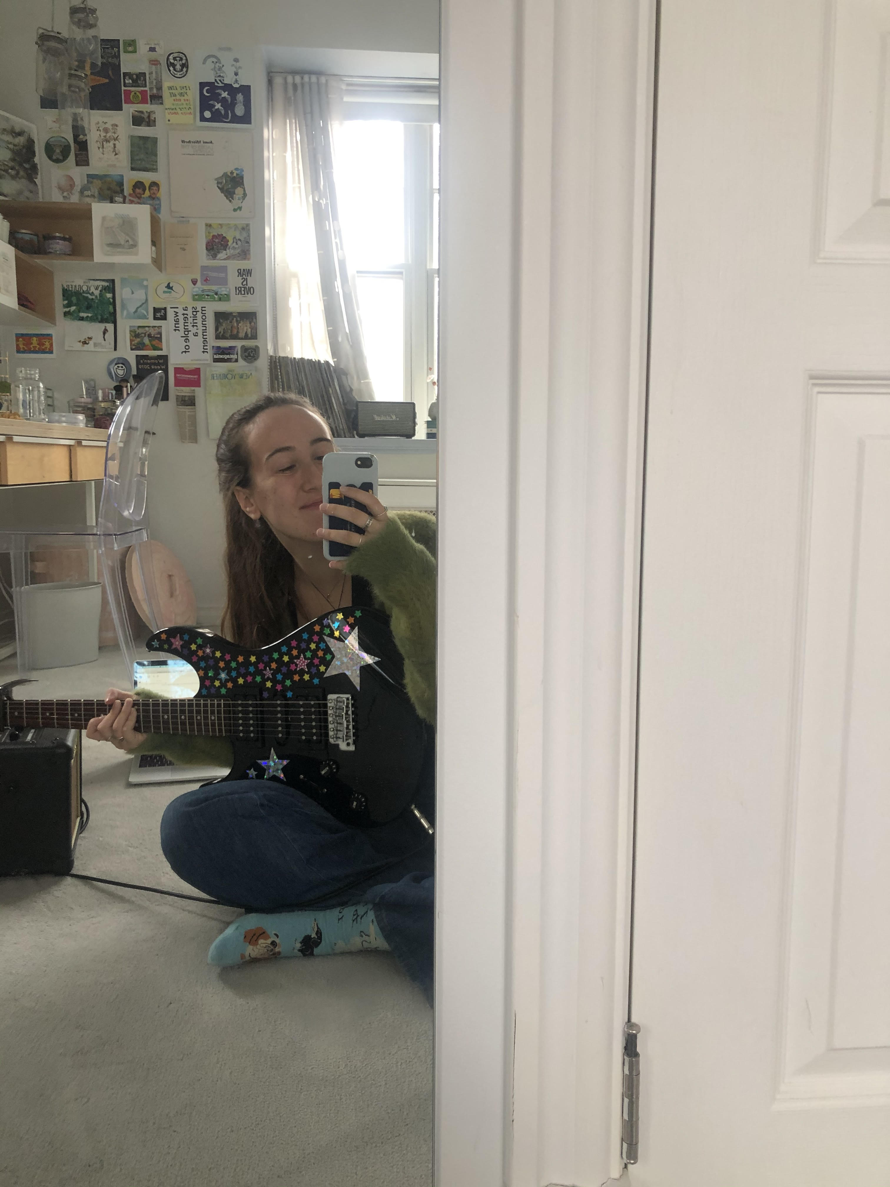 Eden Rosenbloom with her electric guitar.