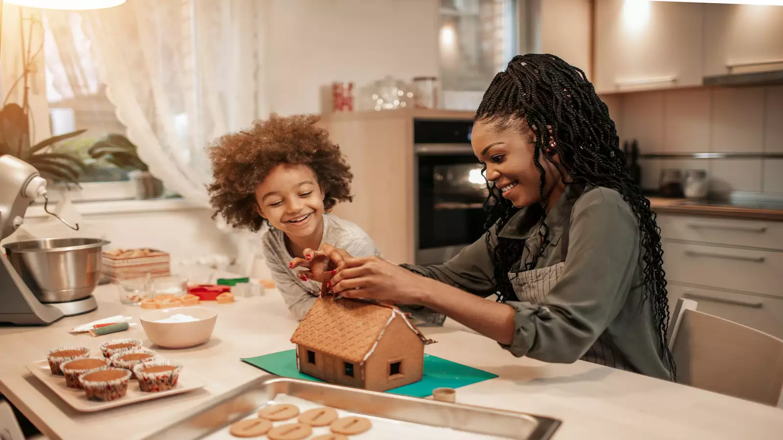 family making a gingerbread house