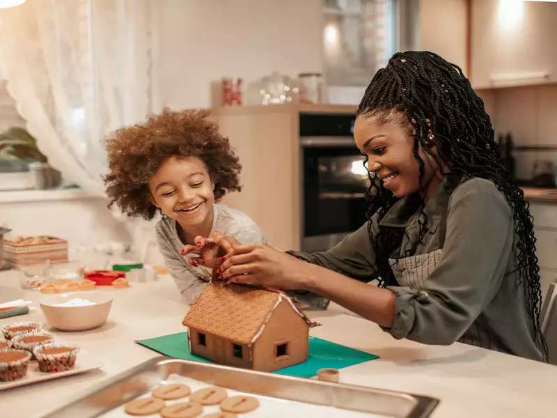 family making a gingerbread house